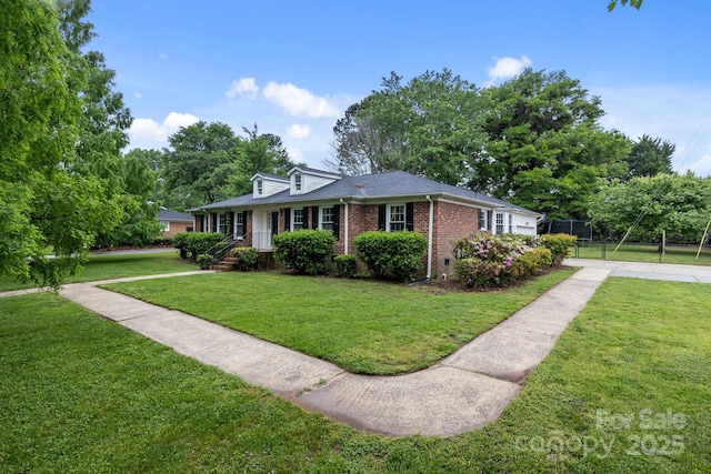 101 Wynnchester Rd, Gastonia, NC 28056 - view of front of home with fence, a front yard, and brick siding