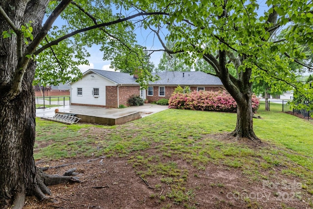 101 Wynnchester Rd, Gastonia, NC 28056 - view of yard featuring fence and a patio area
