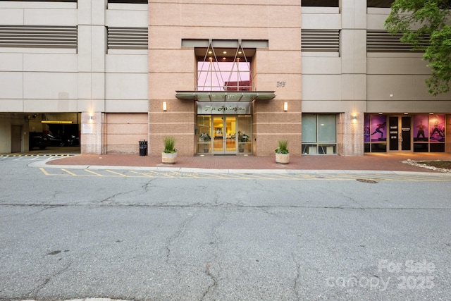 315 Arlington Ave Unit 1104, Charlotte, NC 28203 - property entrance featuring brick siding