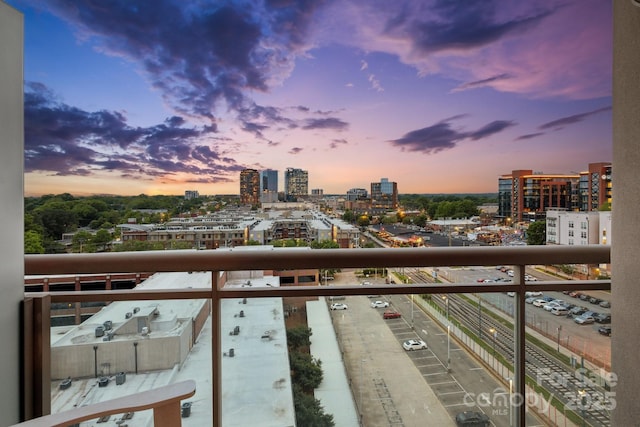 315 Arlington Ave Unit 1104, Charlotte, NC 28203 - balcony at dusk with a view of city