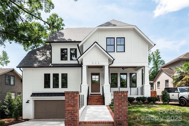 632 Dorothy Dr, Charlotte, NC 28203 - view of front of property with a porch, an attached garage, driveway, and a shingled roof
