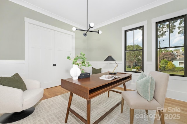 632 Dorothy Dr, Charlotte, NC 28203 - office area with a chandelier, a decorative wall, light wood-type flooring, and a wainscoted wall