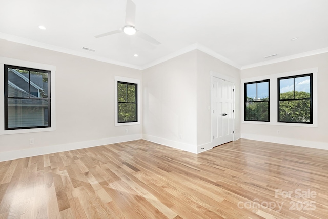 632 Dorothy Dr, Charlotte, NC 28203 - empty room featuring plenty of natural light, light wood-style floors, crown molding, baseboards, and a ceiling fan