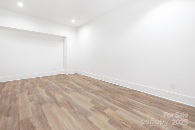 632 Dorothy Dr, Charlotte, NC 28203 - empty room featuring light wood finished floors, baseboards, and recessed lighting