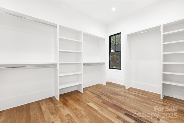 632 Dorothy Dr, Charlotte, NC 28203 - walk in closet with light wood-style floors