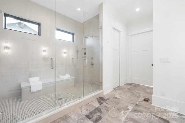 632 Dorothy Dr, Charlotte, NC 28203 - bathroom with a stall shower, baseboards, and recessed lighting