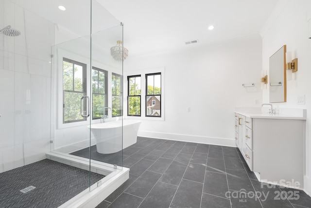 632 Dorothy Dr, Charlotte, NC 28203 - full bathroom with a stall shower, vanity, recessed lighting, and a freestanding bath