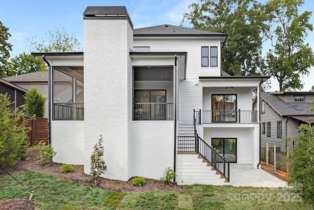 632 Dorothy Dr, Charlotte, NC 28203 - rear view of property featuring stairs, fence, a chimney, and a patio area
