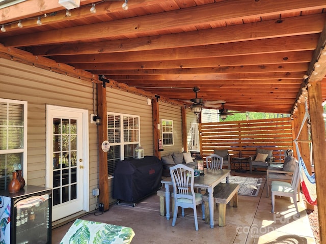 view of patio / terrace with grilling area, outdoor lounge area, and ceiling fan