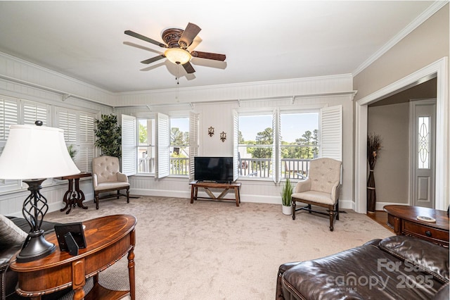 5933 Flintlock Ct, Hickory, NC 28601 - carpeted living room with ornamental molding, a ceiling fan, and baseboards