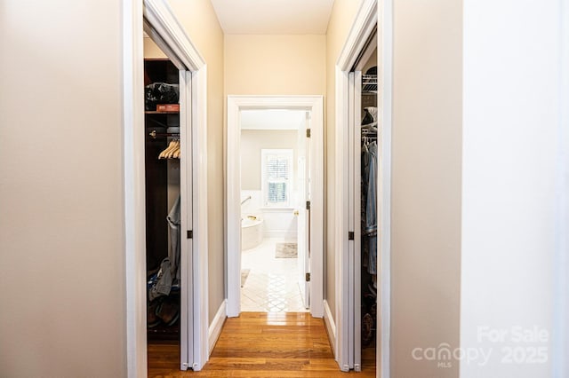 5933 Flintlock Ct, Hickory, NC 28601 - hallway with wood finished floors