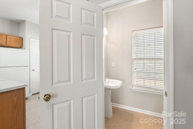 bathroom with baseboards