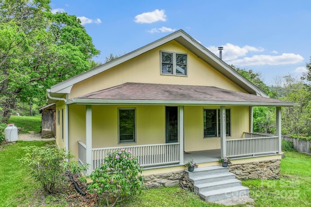 443 Ox Creek Rd, Weaverville, NC 28787 - rear view of property with covered porch, a shingled roof, and a yard