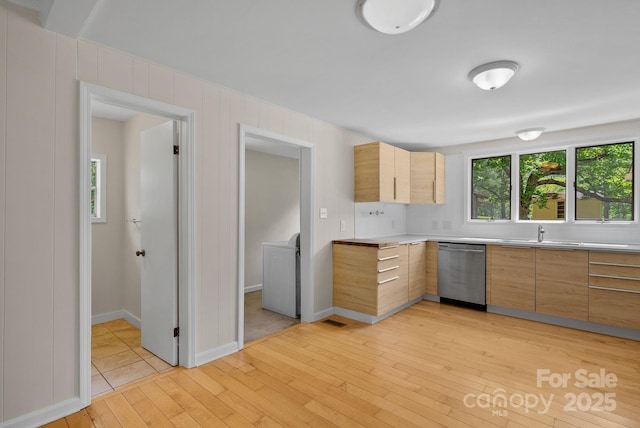 443 Ox Creek Rd, Weaverville, NC 28787 - kitchen with dishwasher, light wood-type flooring, light countertops, modern cabinets, and a sink