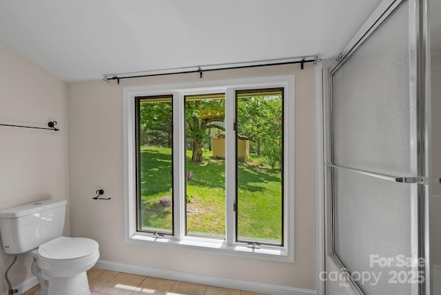 443 Ox Creek Rd, Weaverville, NC 28787 - bathroom featuring toilet, tile patterned flooring, and baseboards