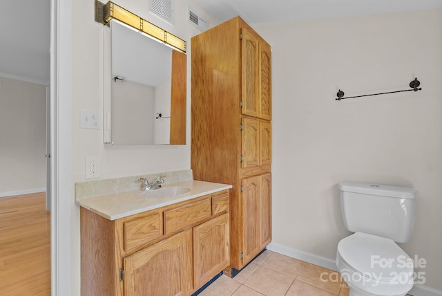 443 Ox Creek Rd, Weaverville, NC 28787 - bathroom with toilet, vanity, baseboards, and tile patterned floors
