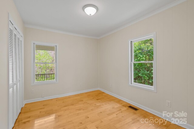 443 Ox Creek Rd, Weaverville, NC 28787 - empty room with light wood-style floors, ornamental molding, and baseboards