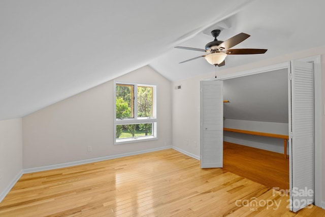 443 Ox Creek Rd, Weaverville, NC 28787 - bonus room featuring wood-type flooring, lofted ceiling, a ceiling fan, and baseboards