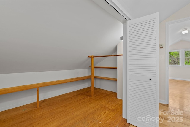 443 Ox Creek Rd, Weaverville, NC 28787 - additional living space featuring lofted ceiling, light wood-style floors, and baseboards