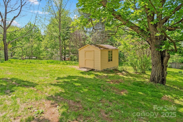 443 Ox Creek Rd, Weaverville, NC 28787 - view of grassy yard featuring a storage unit and an outdoor structure