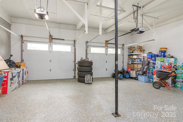 garage featuring a garage door opener