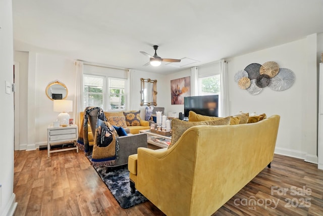 139 5th St, Huntersville, NC 28078 - living area featuring ceiling fan, wood finished floors, and baseboards