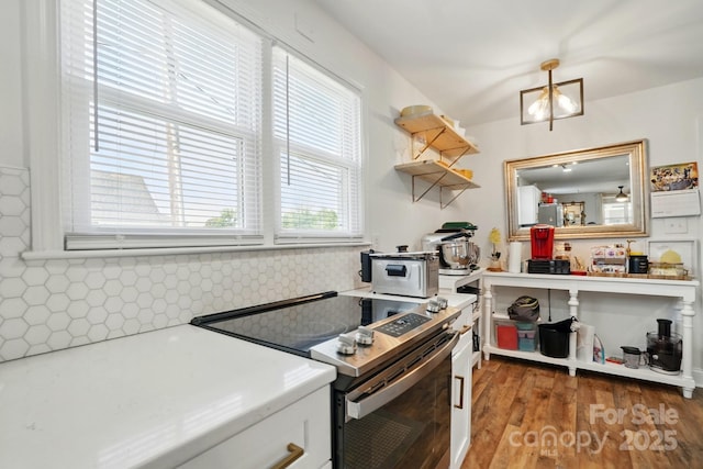 139 5th St, Huntersville, NC 28078 - kitchen featuring electric stove, light countertops, white cabinets, and open shelves
