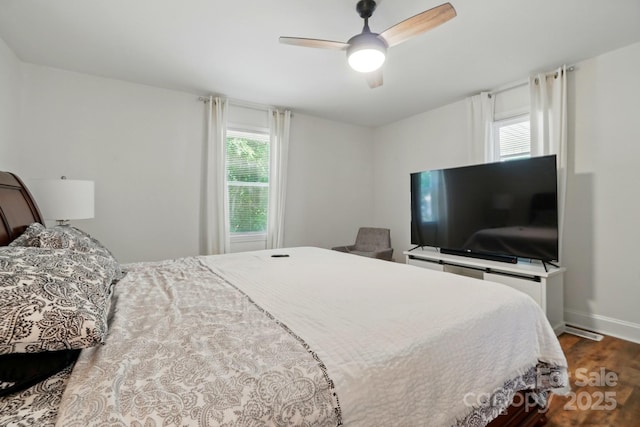 139 5th St, Huntersville, NC 28078 - bedroom featuring wood finished floors, baseboards, and ceiling fan