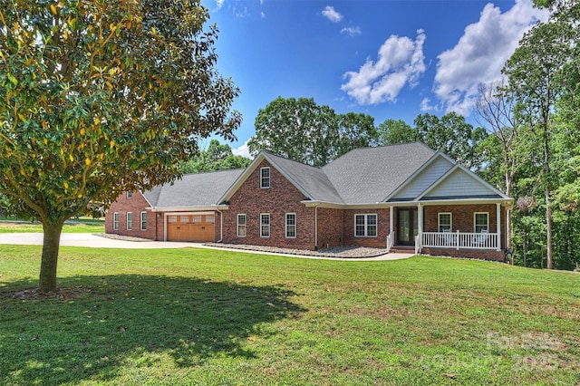 3009 Brooks Mill Ln, Wingate, NC 28174 - view of front of home with brick siding, a garage, concrete driveway, and a front lawn