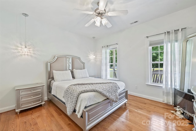 3009 Brooks Mill Ln, Wingate, NC 28174 - bedroom featuring light wood finished floors, baseboards, and ceiling fan