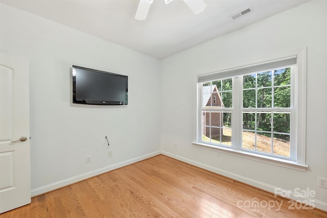 3009 Brooks Mill Ln, Wingate, NC 28174 - spare room featuring light wood-type flooring, baseboards, and ceiling fan