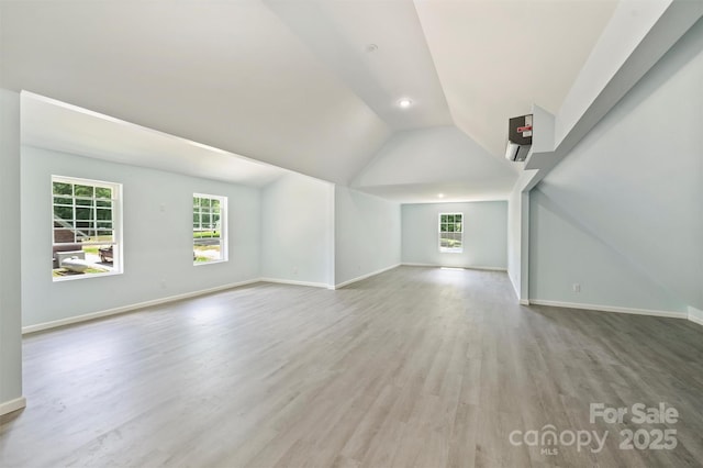 3009 Brooks Mill Ln, Wingate, NC 28174 - bonus room featuring wood finished floors, lofted ceiling, and baseboards