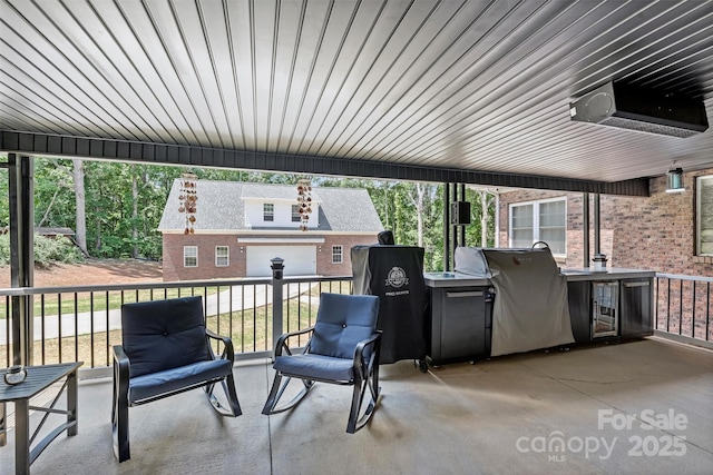 3009 Brooks Mill Ln, Wingate, NC 28174 - view of patio featuring a grill and exterior kitchen
