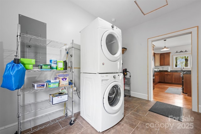 630 Graybeal Holw, Creston, NC 28615 - laundry room with stacked washer / dryer and baseboards