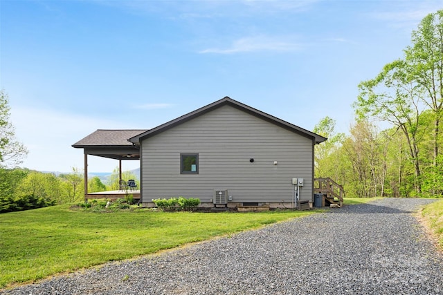 630 Graybeal Holw, Creston, NC 28615 - view of home's exterior with a lawn and a ceiling fan