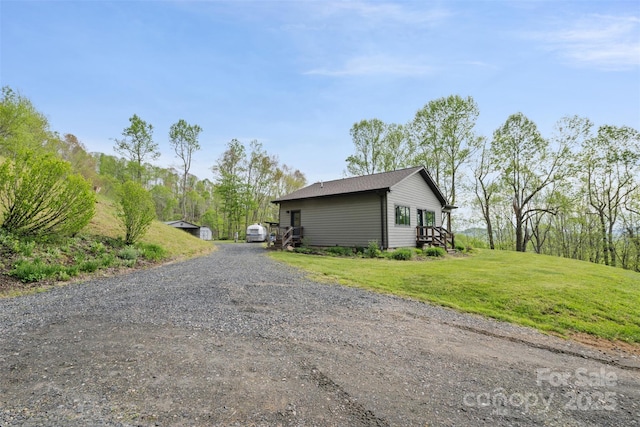 630 Graybeal Holw, Creston, NC 28615 - view of property exterior with a yard and driveway