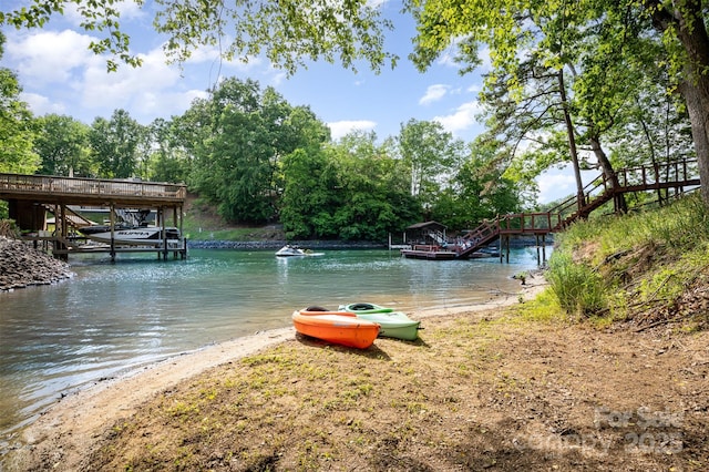 view of water feature with a dock