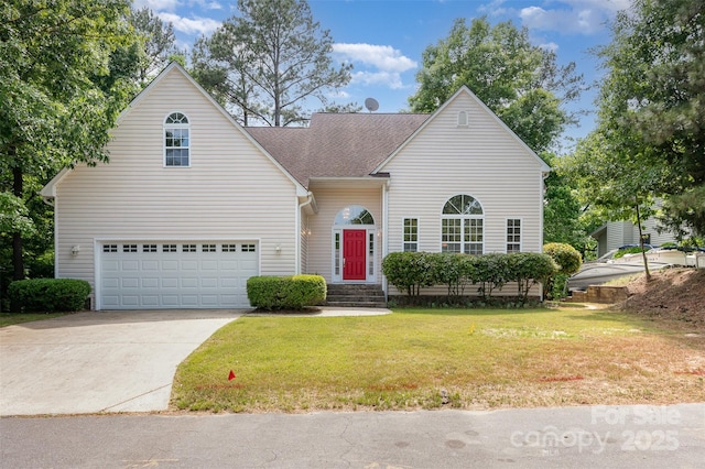 traditional home with a garage, a front lawn, and concrete driveway