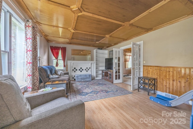 sunroom featuring french doors