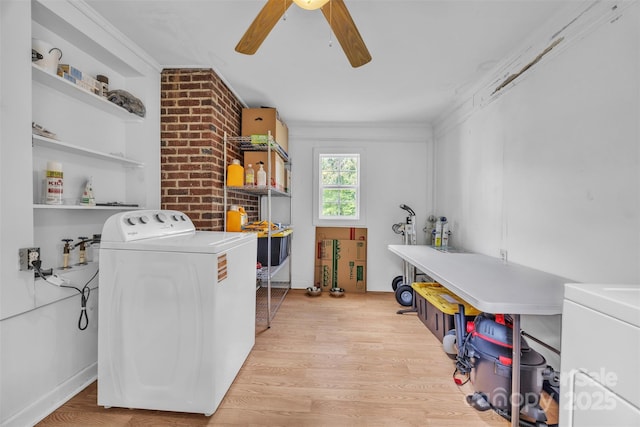 washroom with independent washer and dryer, a ceiling fan, laundry area, and wood finished floors