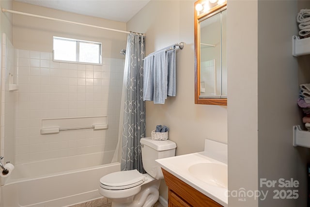 full bathroom with vanity, toilet, and shower / tub combo