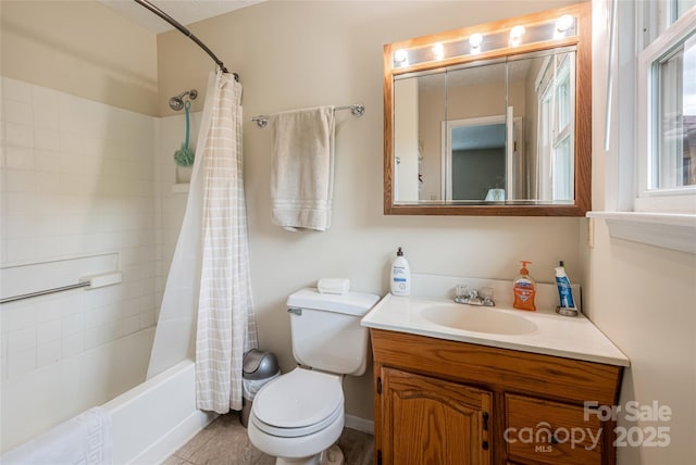 bathroom with vanity, shower / bath combo, and toilet