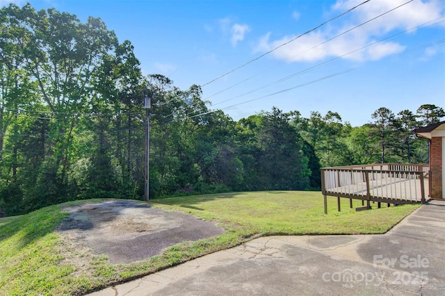 view of yard featuring a deck