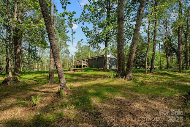 75 White Pine Dr, Fletcher, NC 28732 - view of yard featuring a wooden deck
