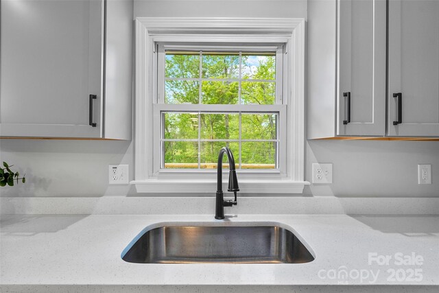 75 White Pine Dr, Fletcher, NC 28732 - interior space featuring light stone countertops and a sink