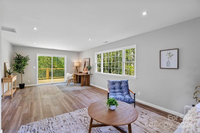 75 White Pine Dr, Fletcher, NC 28732 - living area featuring a healthy amount of sunlight, baseboards, and visible vents