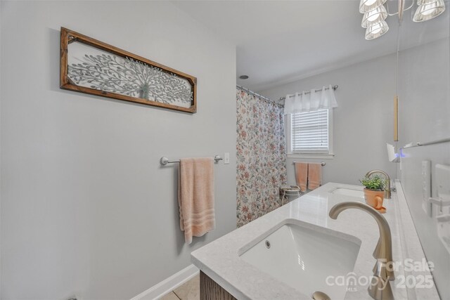 5507 Land Harbour Dr, Granite Falls, NC 28630 - full bathroom with double vanity, tile patterned flooring, curtained shower, and baseboards