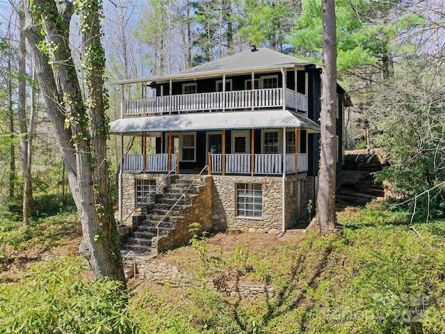 40 Wells Rd, Waynesville, NC 28785 - view of front of home with covered porch, stairway, and stone siding