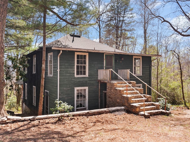 40 Wells Rd, Waynesville, NC 28785 - back of property featuring a shingled roof and stairs