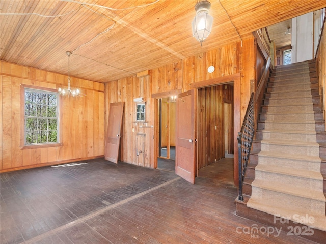 40 Wells Rd, Waynesville, NC 28785 - interior space featuring wood ceiling, a chandelier, hardwood / wood-style floors, wooden walls, and stairs